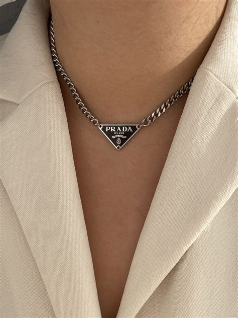 prada silver tag necklace|Prada symbol necklace.